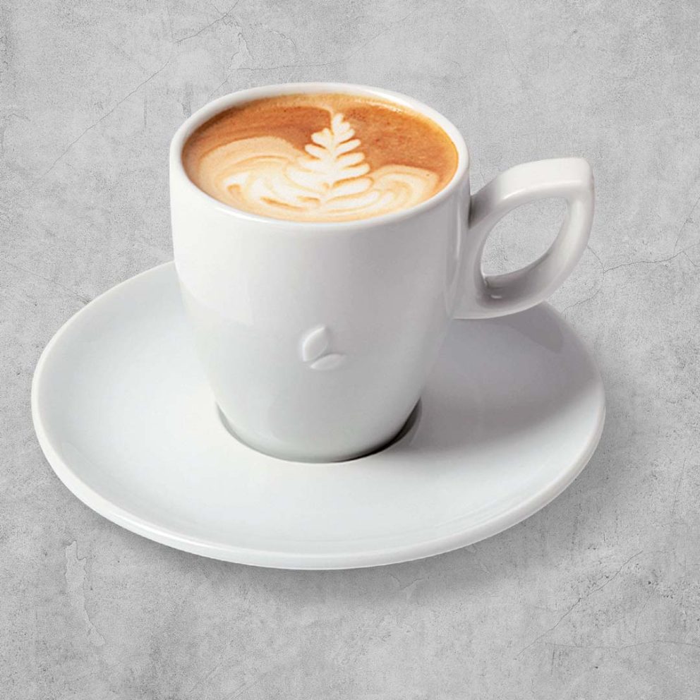 Cappuccino mit Latte Art Blatt